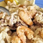 Pasta con pesto di pistacchio e pesce, piatto tipico di San Vito Lo Capo.