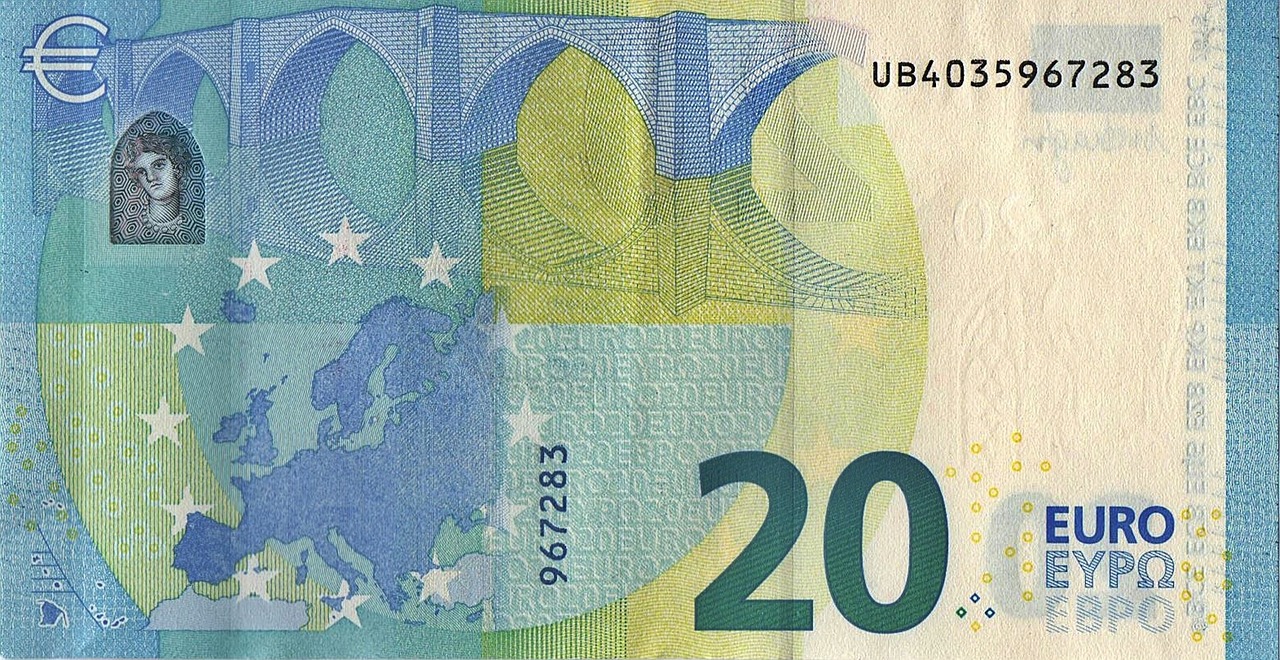 Banconote da 20 euro con simbolo di avviso, segno di possibile falsificazione o anomalia.